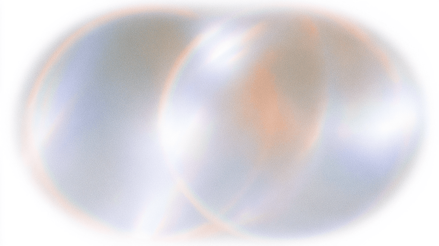 Soft overlapping light orbs in pale blue and orange